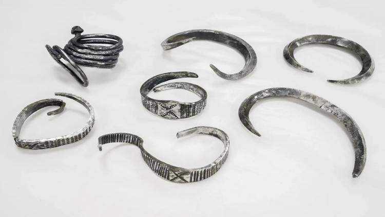 ‘Spectacular silver’: 7 rare Viking armlets unearthed by a Danish student